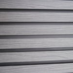 Grey Slatted Cladding Installed View With Capped Surface Texture