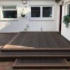 Chocolate Wood Grain Decking With Steps And Lights
