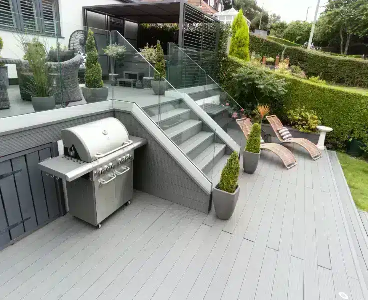 Slate Grey Composite Decking In Raised Garden With Steps
