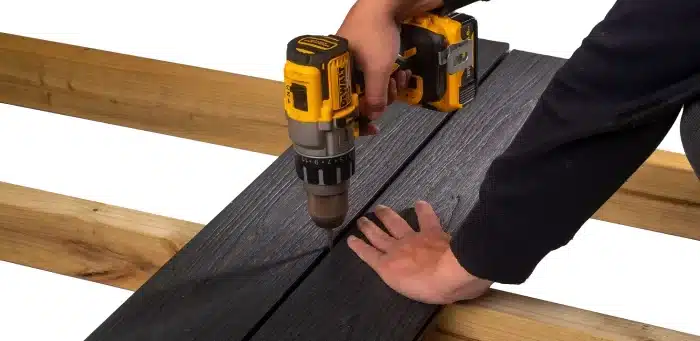 Using A Power Drill To Fix Composite Decking