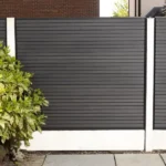 Black slatted composite fencing panel