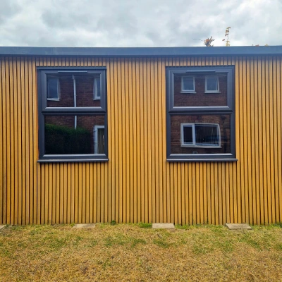 Modern Slatted Cladding In Teak