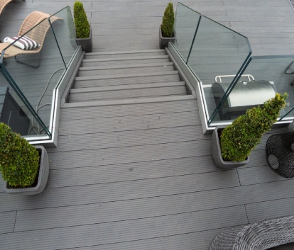 Steps with glass balustrades and BBQ