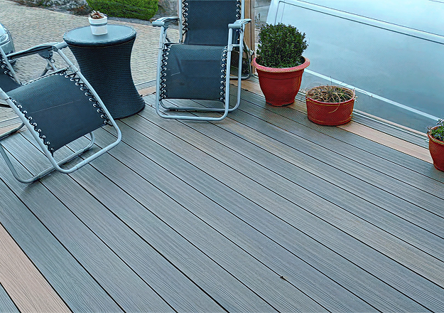 Caravan deck in mixed colour walnut and teak board upgrade with composite decking