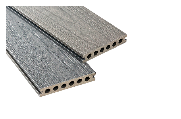 Reversible dual colour capped composite decking in grey