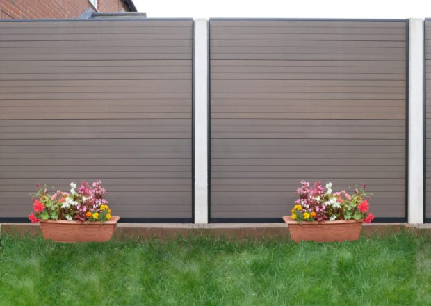 Chocolate Thin Grooved Fence Panels With Wooden Boarder & Plants