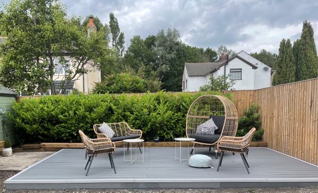 Grey Wood Grain Composite Decking On Standalone Deck With Grey Trims