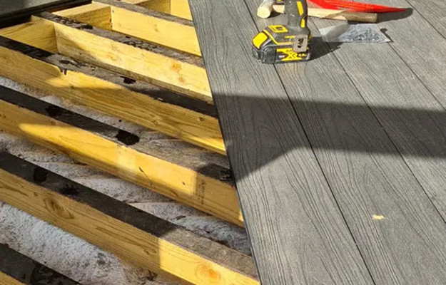 Fixing Clips To Joists With Tape Joist and Drill On Deck