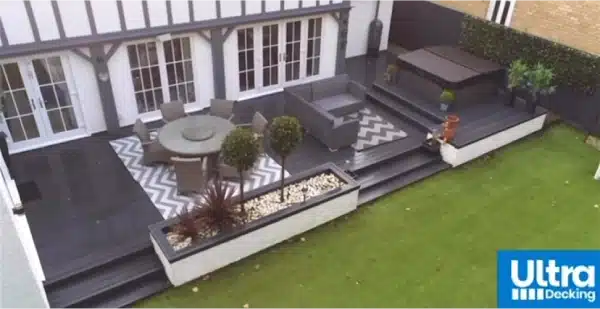 Anthracite grey & Dark grey decking used in modern design with tudor house start video image