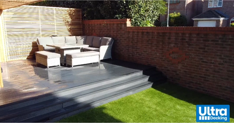 Raised Deck With Firepit Table With Rattan Furniture