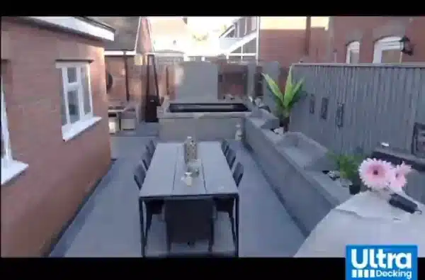 Light grey decking boards used in modern garden video start image