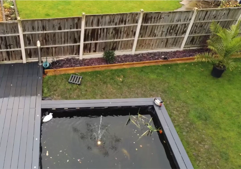 Wood Grain Composite Deck Boards Built Around A Pond