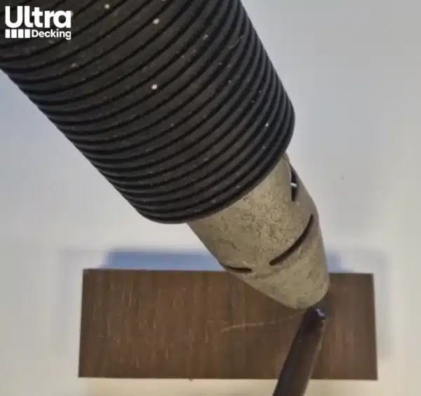 Using heat gun and wax to remove scratches from capped composite video image